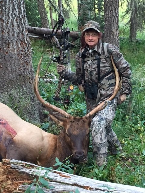 Trophy game — Ski & Bow Rack Wall of Game